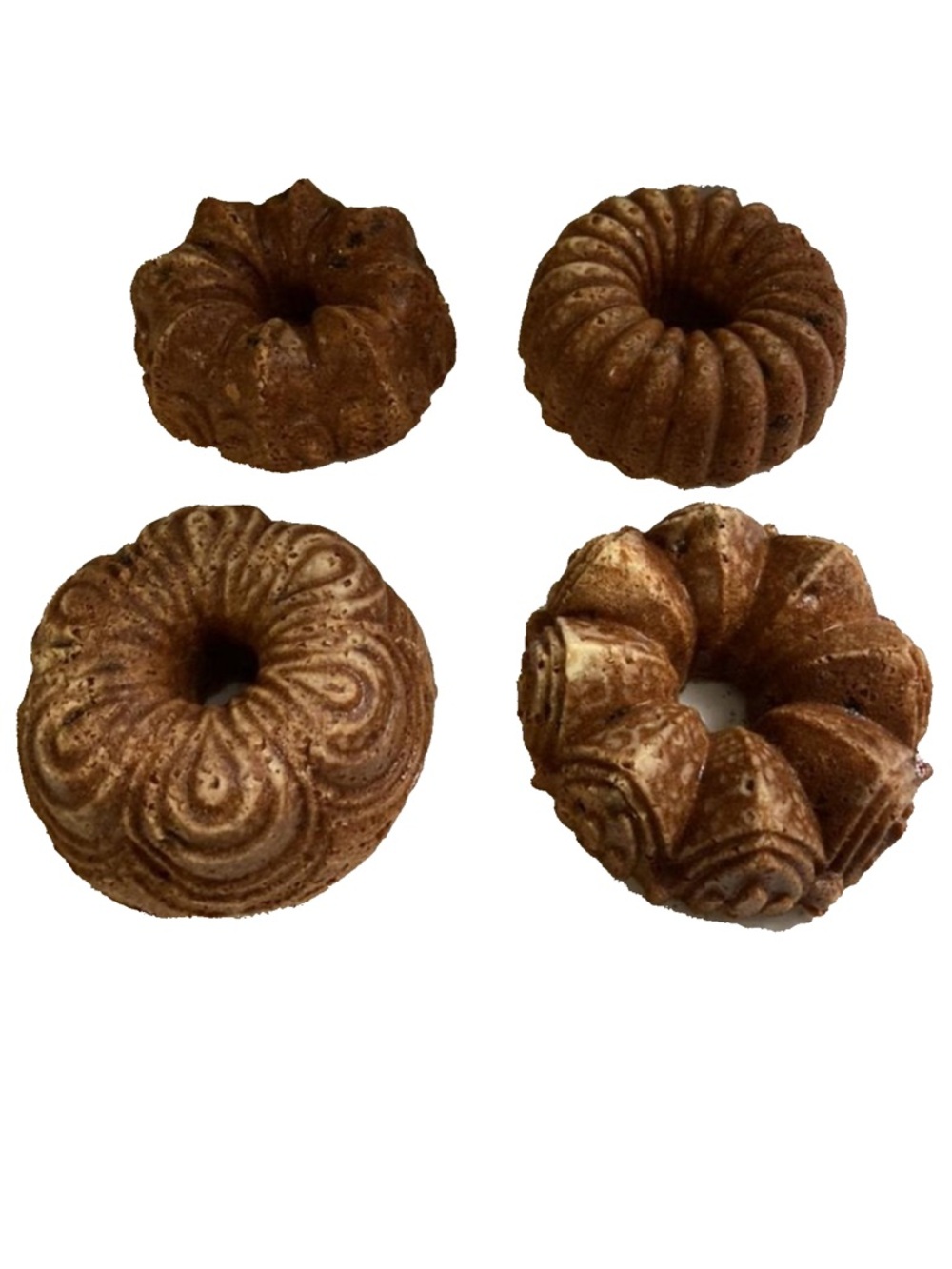 Nordic Ware Gold 9 Cup Bundt®
Quartet Pan 4 Cake Molds in 1 pan Baking Sheet - Picture 6 of 6